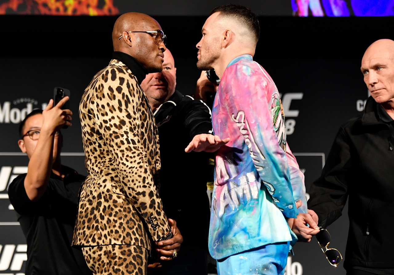 Watch Usman push Covington in an explosive UFC 268 fight after being taunted by his dad about being a'scam artist.