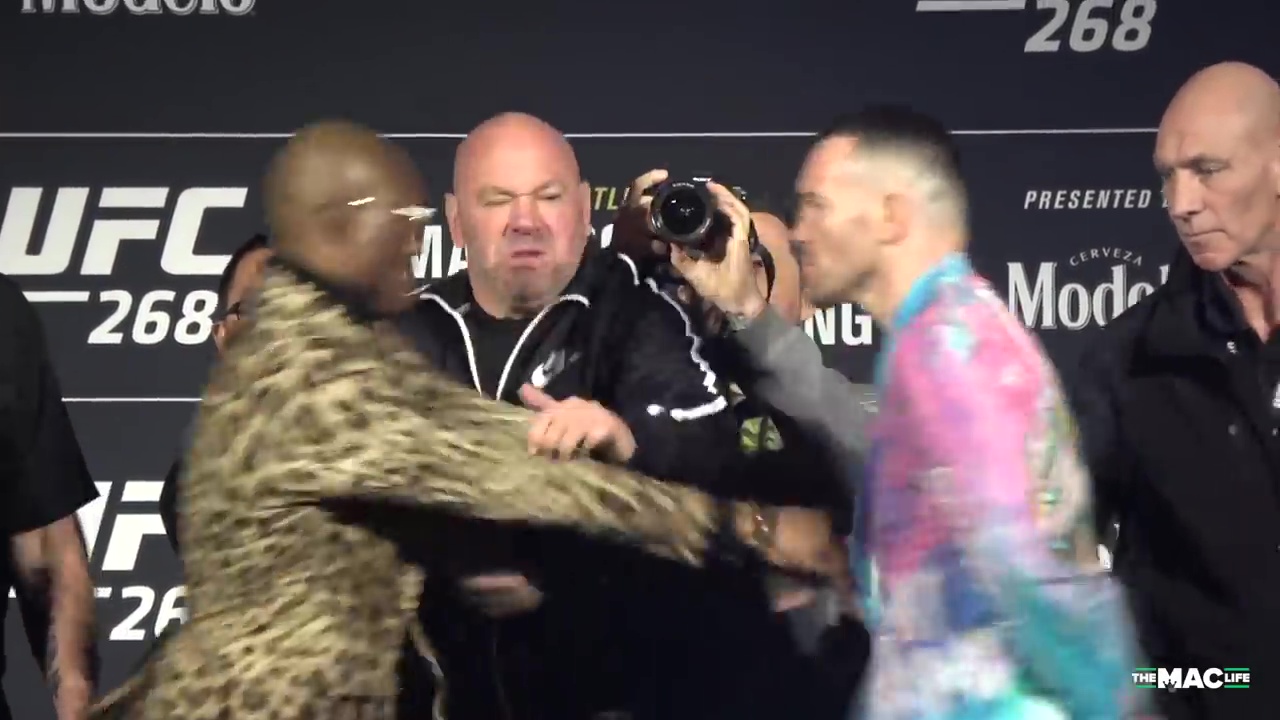 Watch Usman push Covington in an explosive UFC 268 fight after being taunted by his dad about being a'scam artist.