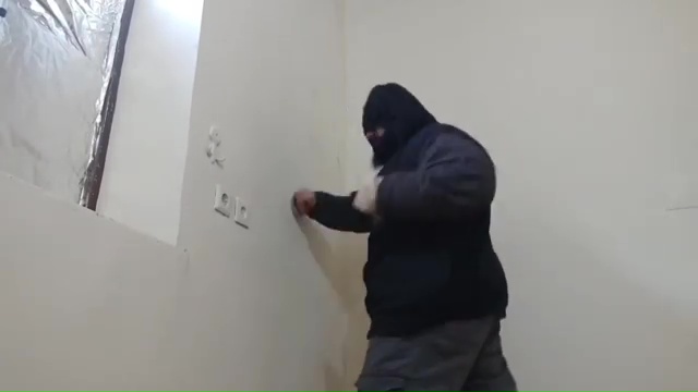 Watch Iranian Hulk Sajad Gharibi repeatedly punch WALL in a crazy workout before he takes on the'scariest man alive'