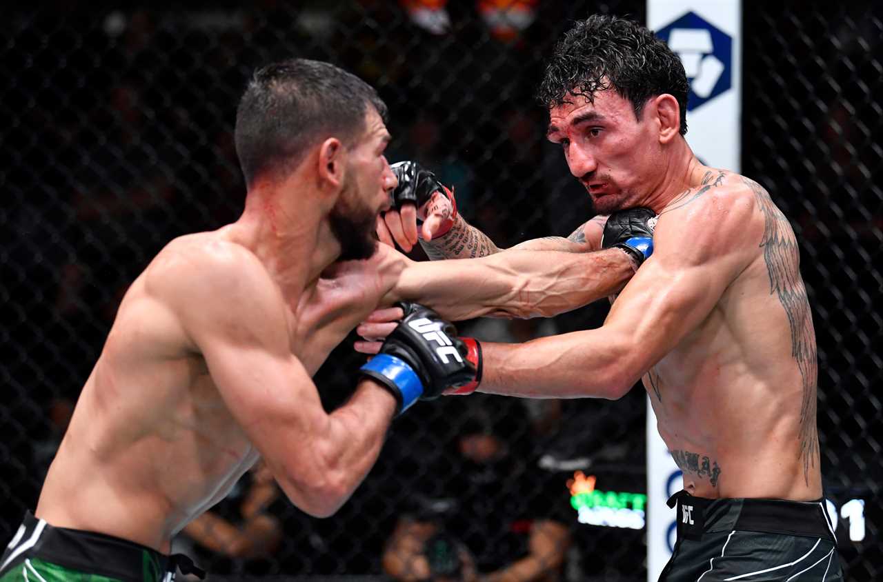 After 'one the greatest fights ever,' Max Holloway and Yair Rod pose for photos in AMBULANCE.
