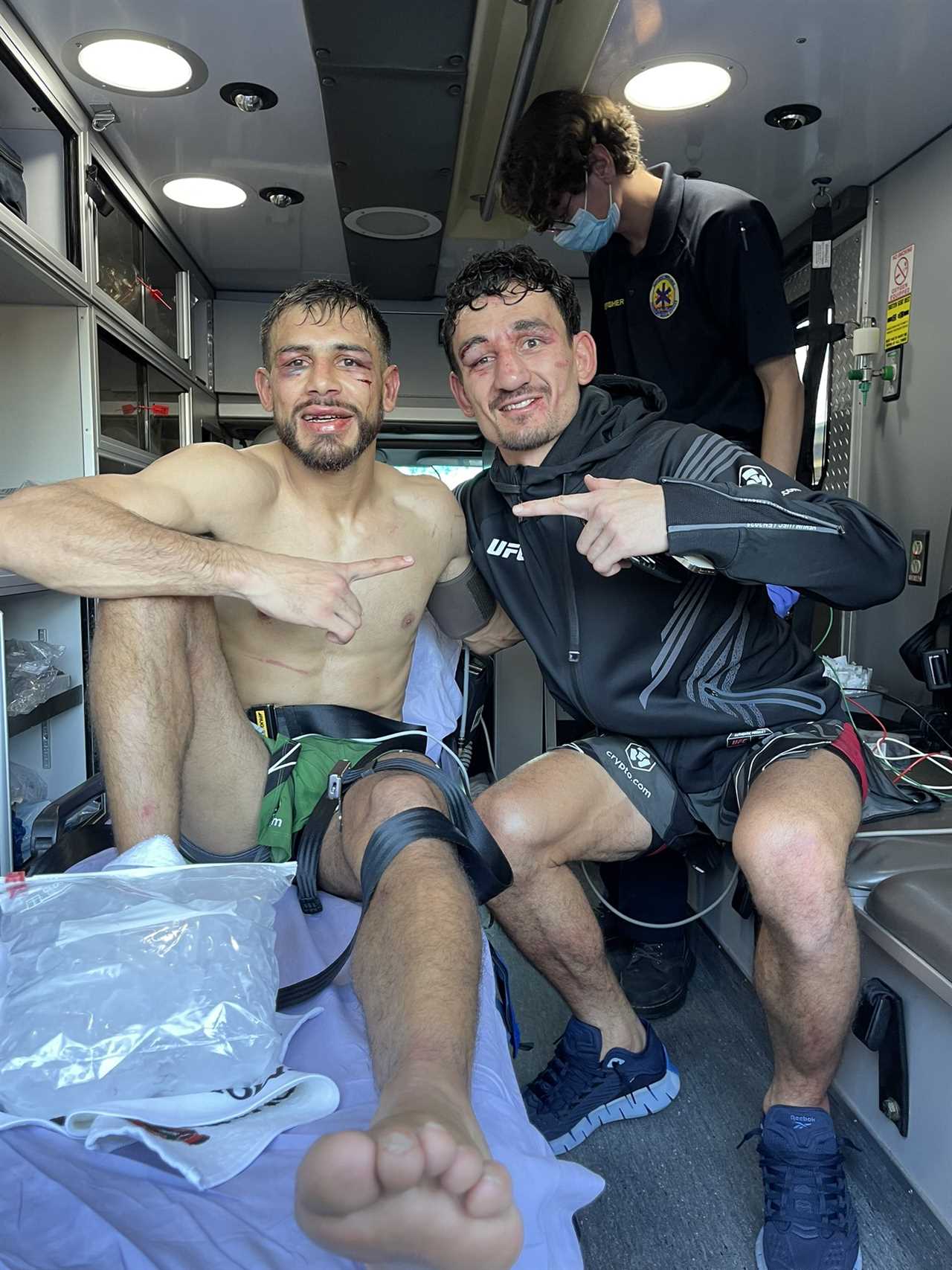 After 'one the greatest fights ever,' Max Holloway and Yair Rod pose for photos in AMBULANCE.