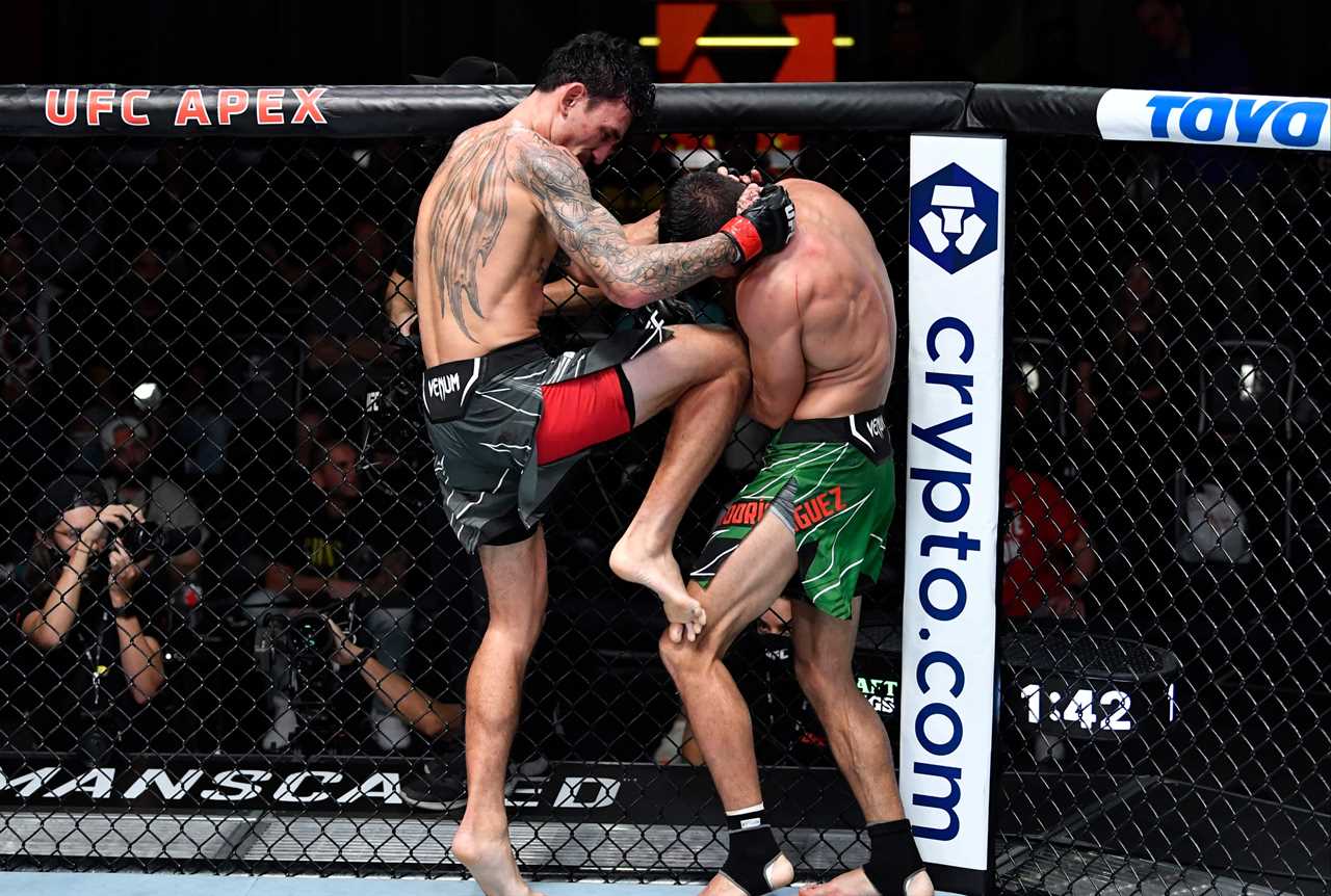 After 'one the greatest fights ever,' Max Holloway and Yair Rod pose for photos in AMBULANCE.