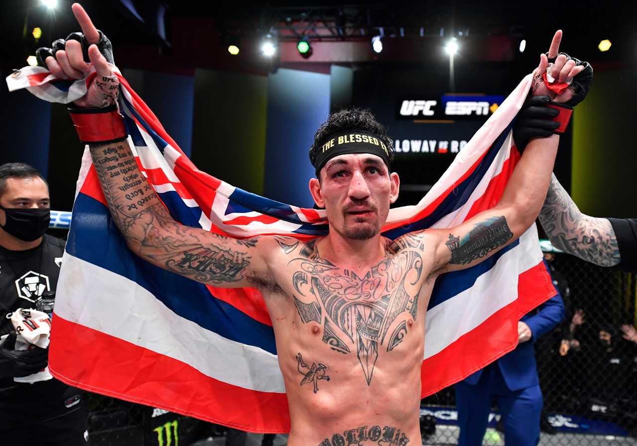 After 'one the greatest fights ever,' Max Holloway and Yair Rod pose for photos in AMBULANCE.