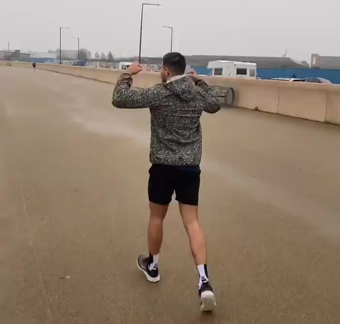 Tyson Fury runs along the drizzly Morecambe Beach with Joseph Parker, bro Tommy and dad John in preparation for his Jake Paul showdown