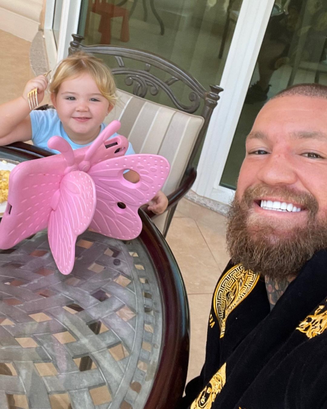 Conor McGregor takes a candid selfie at breakfast with his daughter, as the UFC star prepares to return from injury