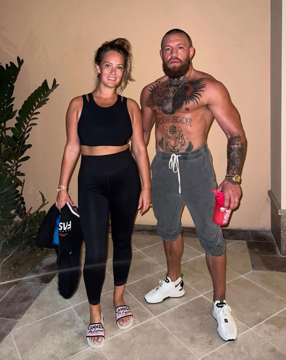 Conor McGregor's jacked frame is shown in pic with his fiancee. His coach says he will start training in a few weeks.
