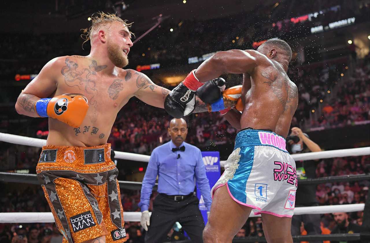Jake Paul's trainer claims Tyron Woodley won't make it to the finish in a rematch. YouTube star has gotten 'exponentially' better.