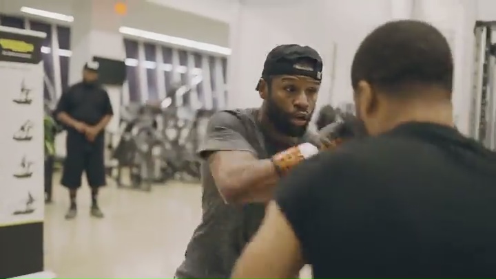 Floyd Mayweather, a 44-year-old boxing legend, effortlessly shows off his speed on pads.