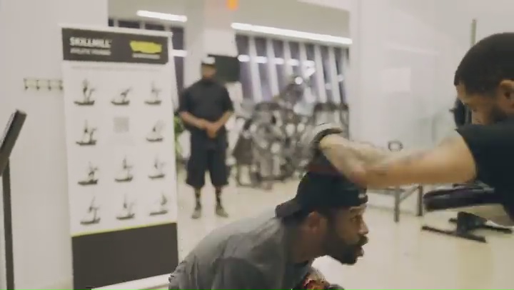 Floyd Mayweather, a 44-year-old boxing legend, effortlessly shows off his speed on pads.