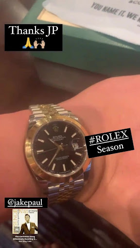 Jake Paul presents Tyron Woodley, Tyron Woodley, and the entire team a ROLEX every day before their rematch. In cheeky jibe to ex-UFC star