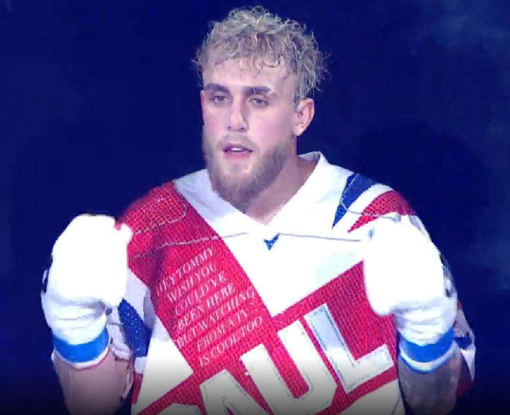 Jake Paul blasts Tyron Woodley KO with custom Union Jack walkout attire, and trolls Tommy Fury 'bitch' Tommy Fury.