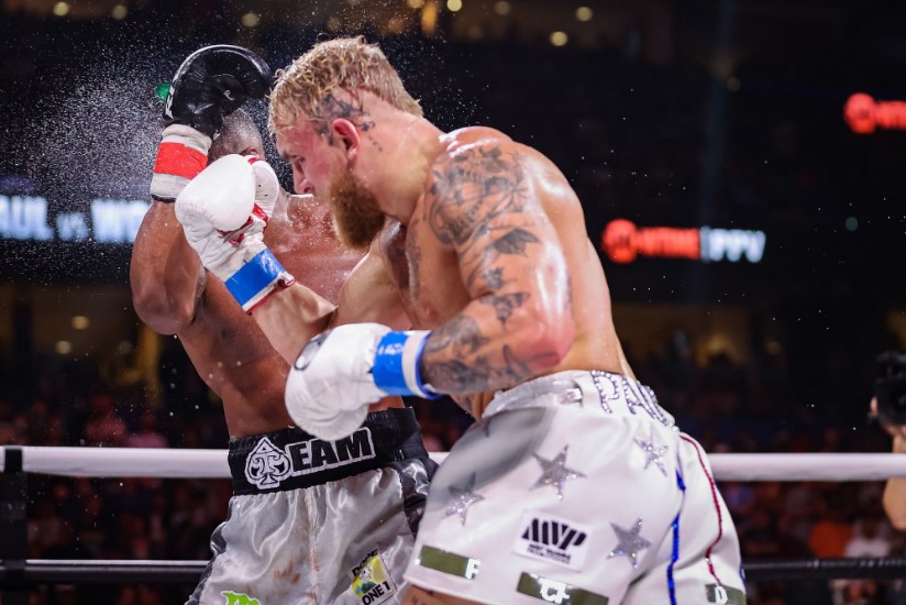 Jake Paul predicted that Tyron Woodley would fight him. He said he would KO and embarrass the ex-UFC champion.