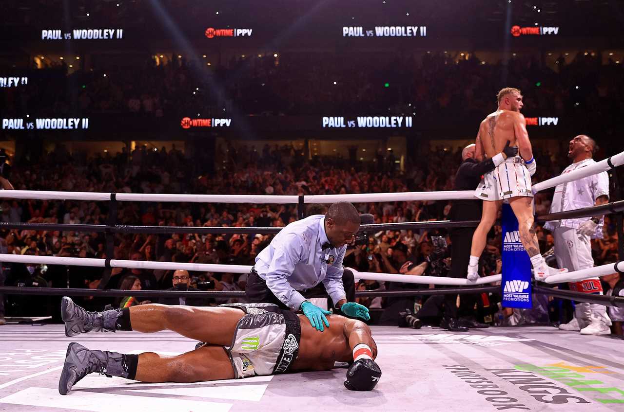 Tyron Woodley and Jake Paul are accused of fixing fight after a'secret hand signal was spotted just moments before KO
