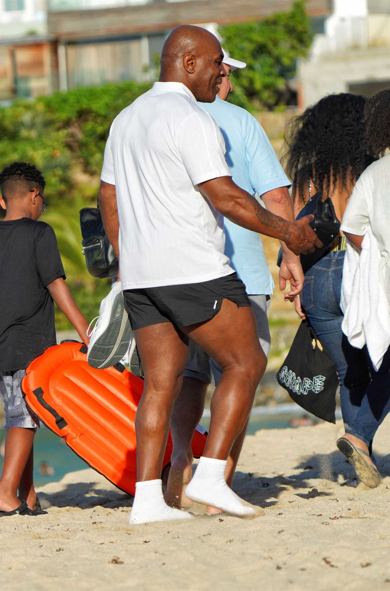 Mike Tyson, the boxing legend, looks great at 55. Tyson will be heading to St Barts with his family and friends for a beach vacation.