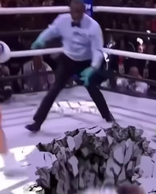 Tyron Woodley gives a PS3,700 prize to a fan for the best meme of Jake Paul knocking Jake out, as he spreads Christmas love.