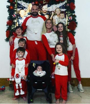 Wayne Rooney and Tyson Fury among the stars who wore matching Christmas outfits when their families woke up to celebrate Christmas