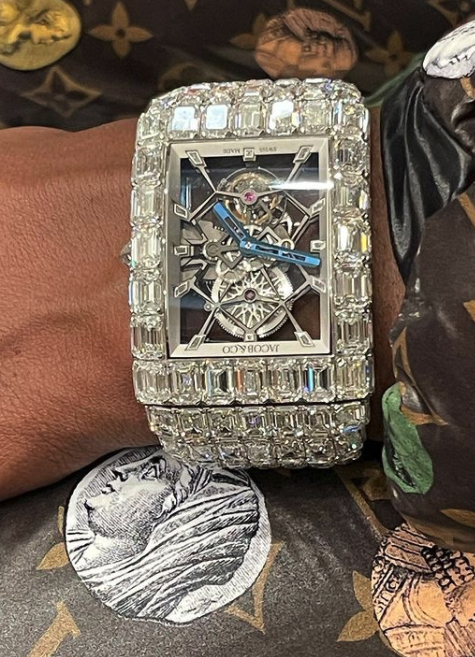 Floyd Mayweather displays his amazing PS13.45 MILLION watch, adorned with huge, dazzling diamonds