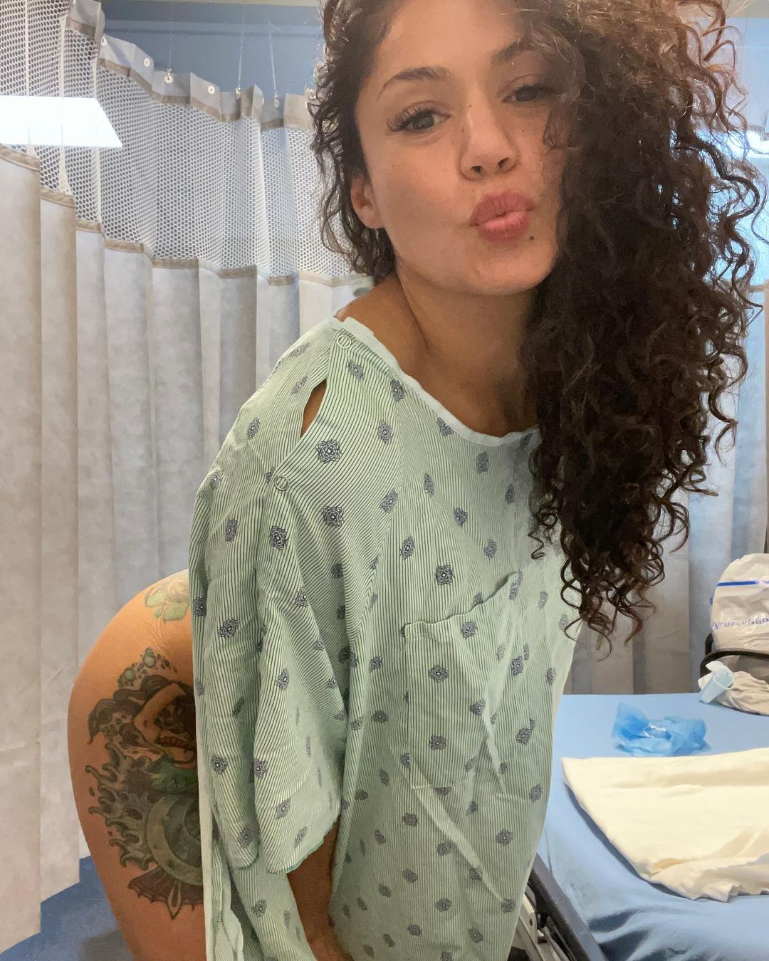Ex-UFC star Pearl Gonzalez makes fans go wild in sexy surgery shoot where she shows off her bum in just a hospital gown