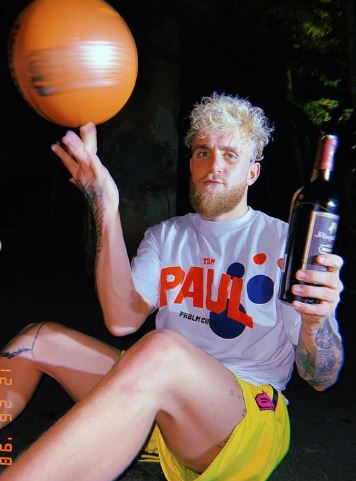 Jake Paul and Julia Rose share steamy photos of their Christmas wish list.