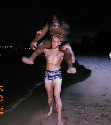 Jake Paul and Julia Rose share steamy photos of their Christmas wish list.