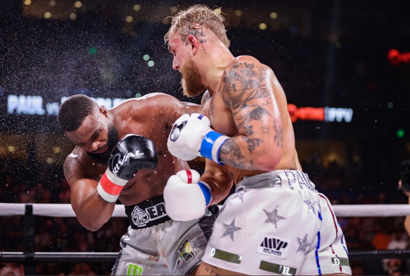 Tyron Woodley's ex-UFC star coach says he didn't know Jake Paul. Jake Paul brutally kicked Tyron Woodley and demanded that he 'go back outside'.