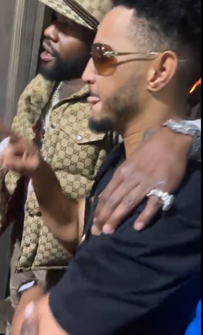 Floyd Mayweather fan refusing to get up on his knees, nearly falls out when he meets a boxing star in Dubai