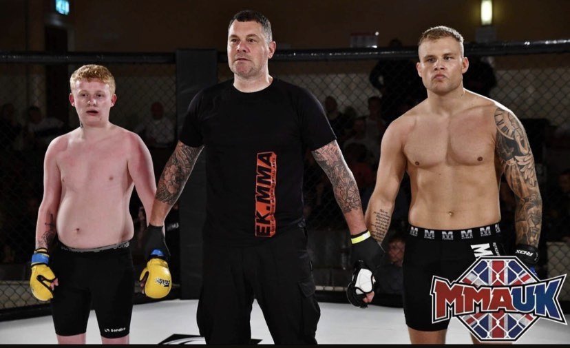 MMA fans furious as a huge fighter knocks out a 'little boy,' who stepped in to replace him.