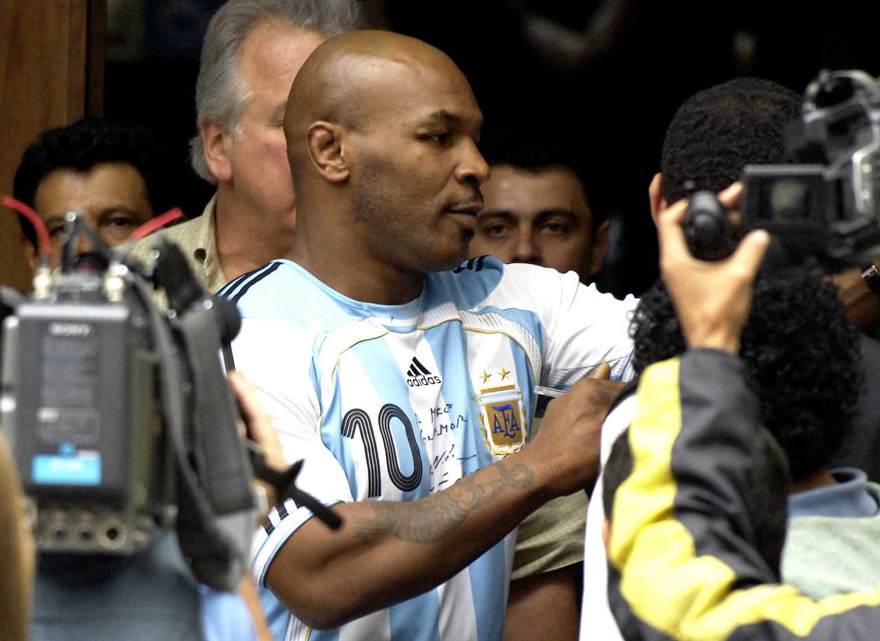 After 'assaulting a cameraman', Mike Tyson made fun of Brazil by wearing a Maradona-signed Argentina shirt to court.