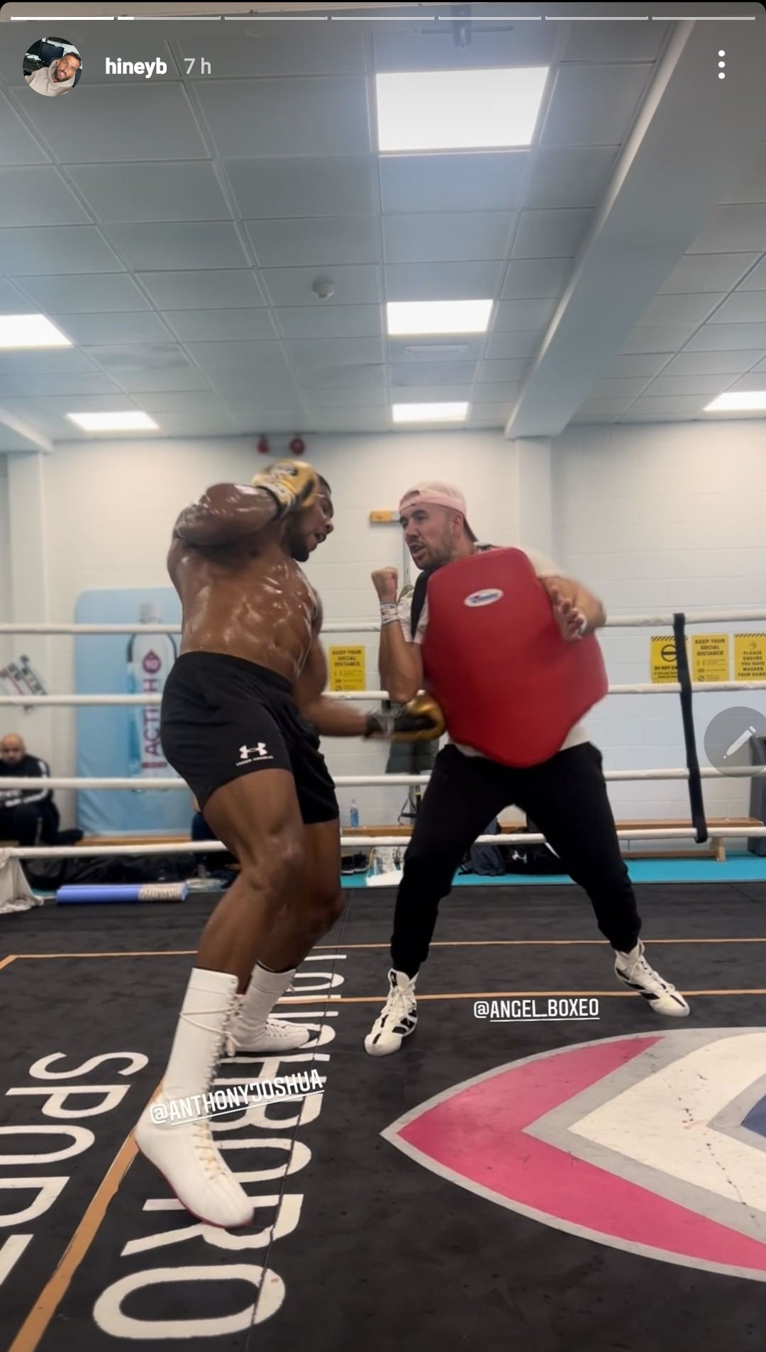 Anthony Joshua shows off his ripped body during a session with Angel Fernandez, as part of a new training program
