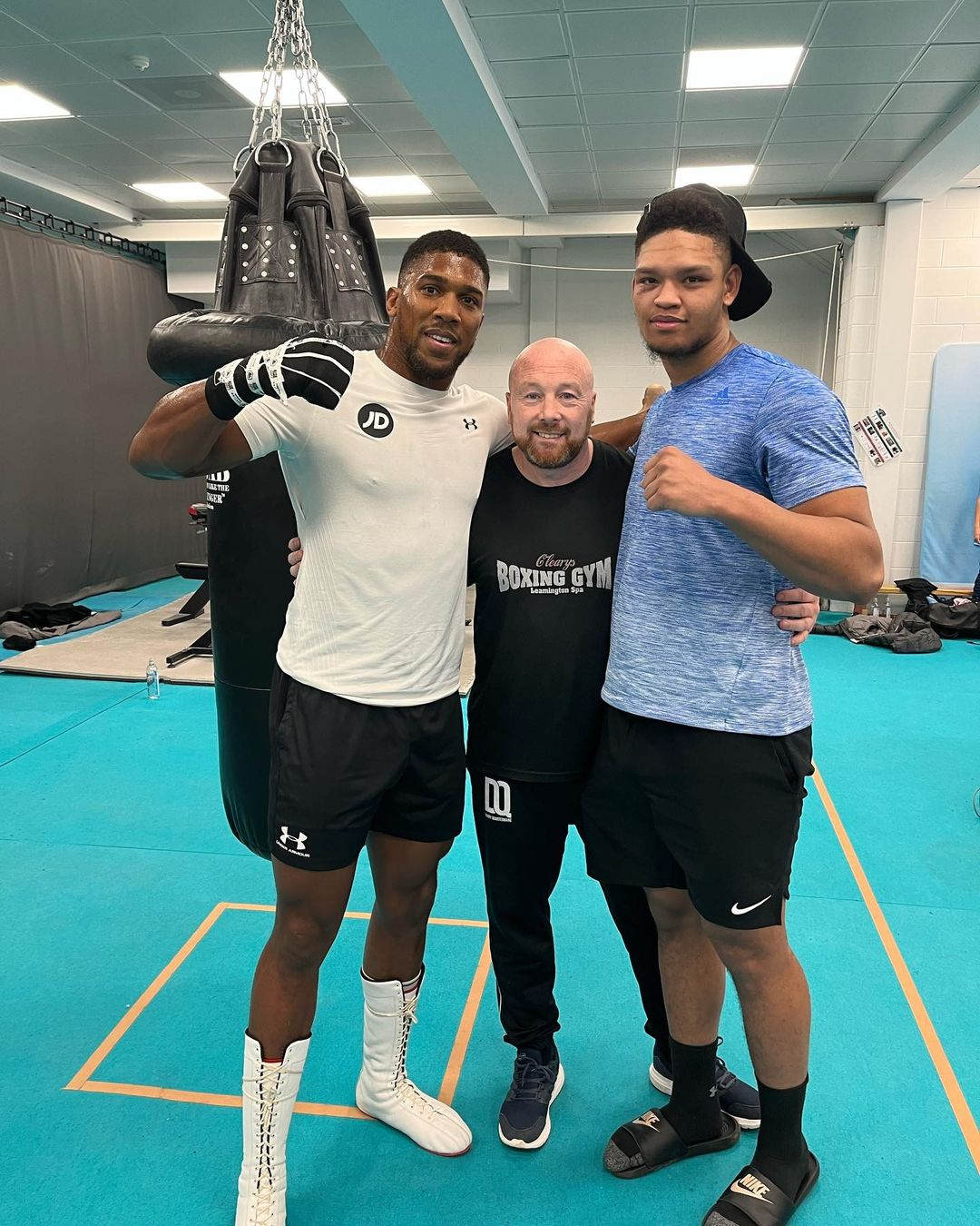 Anthony Joshua shows off his ripped body during a session with Angel Fernandez, as part of a new training program
