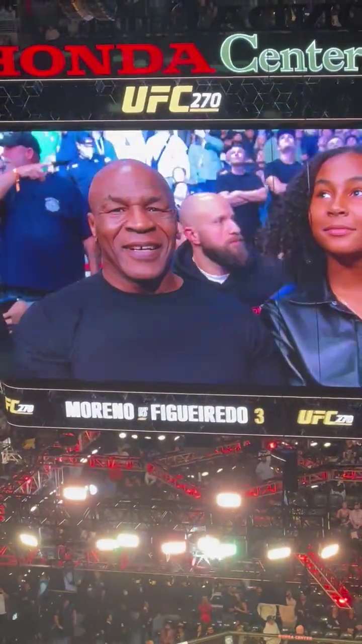 Watch Nate Diaz showcasing his 'joints' live on TV at UFC 270. The camera cuts quickly to Mike Tyson.
