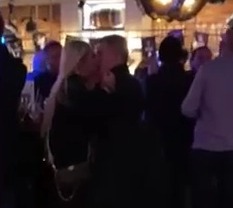 After watching Man City's draw against Southampton, Ricky Hatton, a boxing legend, snogs a mystery woman in a pub