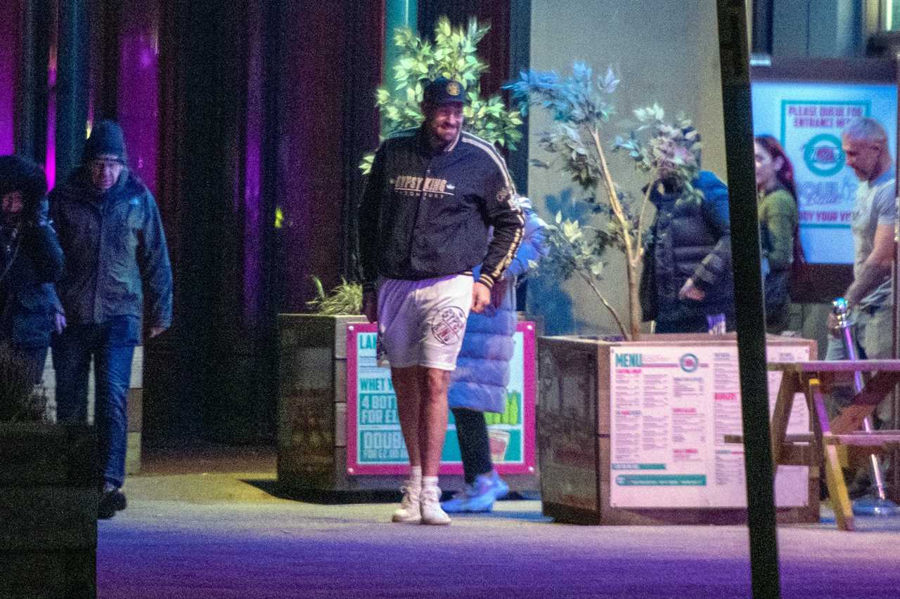 Tyson Fury braves the freezing cold in Gypsy King SHORTS while he enjoys a night at Morecambe Bowling Alley with his wife Paris