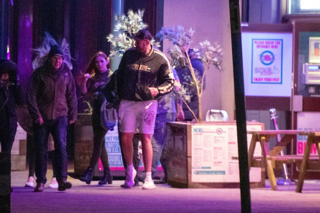 Tyson Fury braves the freezing cold in Gypsy King SHORTS while he enjoys a night at Morecambe Bowling Alley with his wife Paris