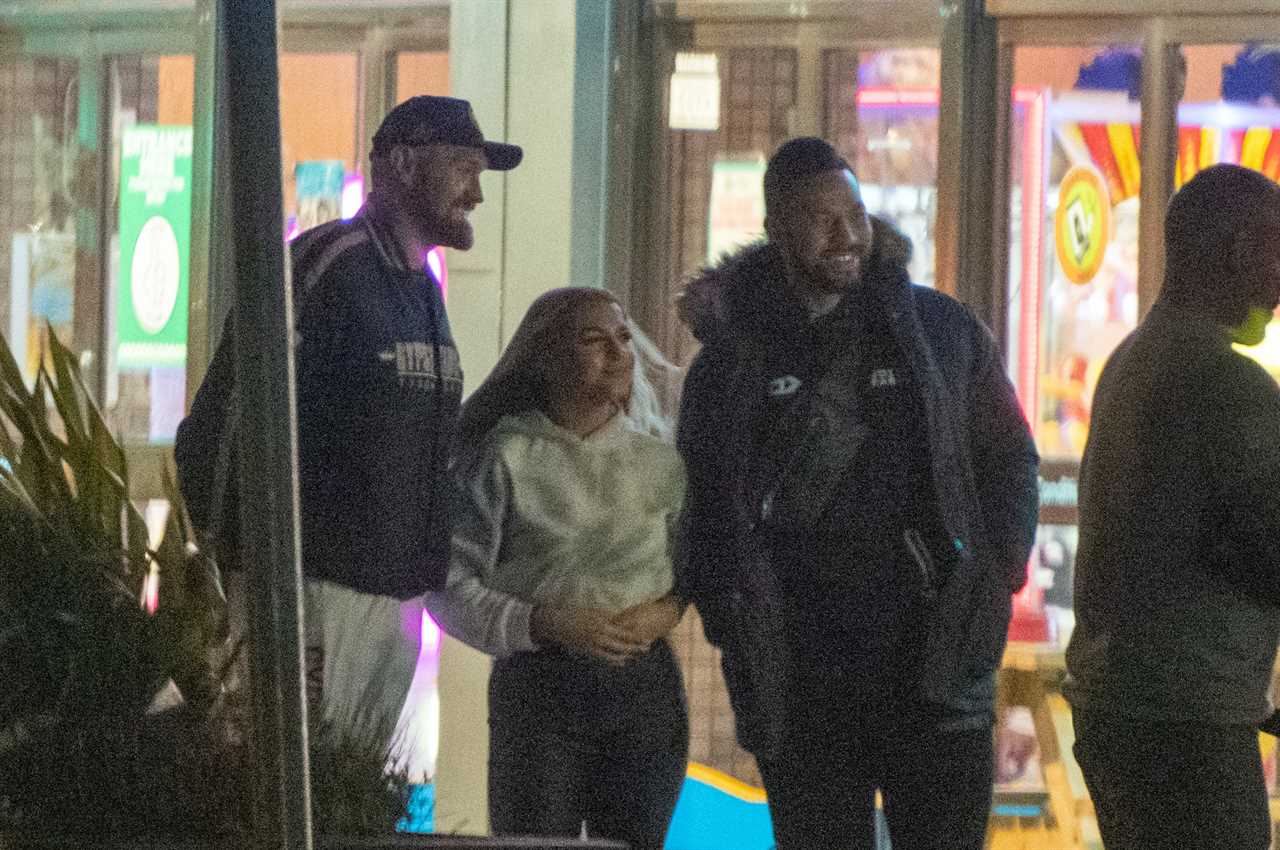 Tyson Fury braves the freezing cold in Gypsy King SHORTS while he enjoys a night at Morecambe Bowling Alley with his wife Paris
