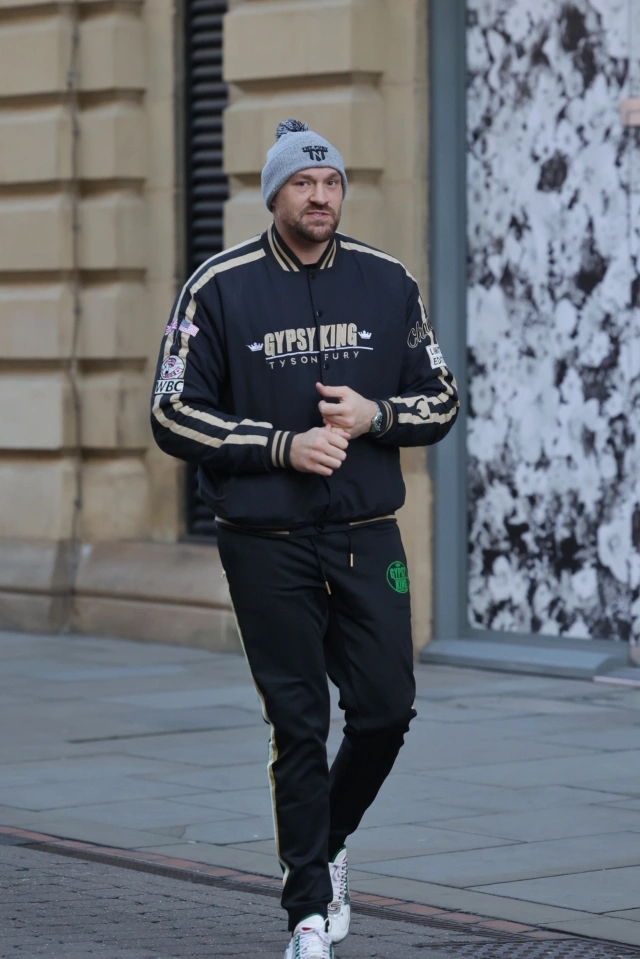 Tyson Fury was spotted in Manchester sporting branded gear while he prepares to fight Dillian Whyte in the Brit War.