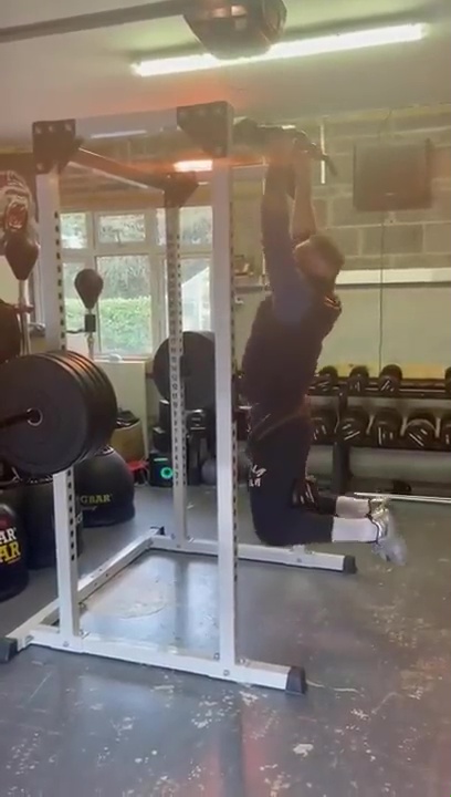 Conor McGregor shows incredible strength in weighted pullups, as he prepares for full training for UFC Return
