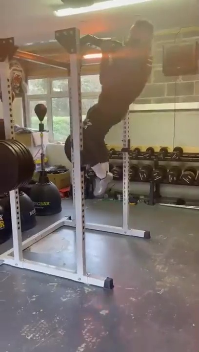 Conor McGregor shows incredible strength in weighted pullups, as he prepares for full training for UFC Return