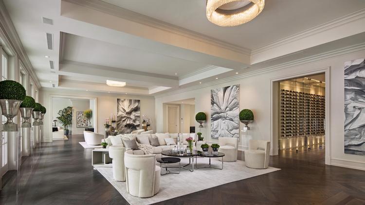 The lounge is open plan with a wine room leading off it