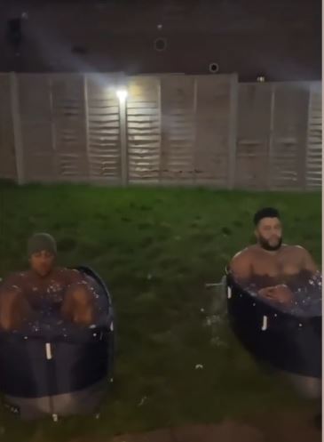 Anthony Joshua takes a freezing cold ice bath during a late-night recovery session in preparation for the Oleksandr Usyk match.
