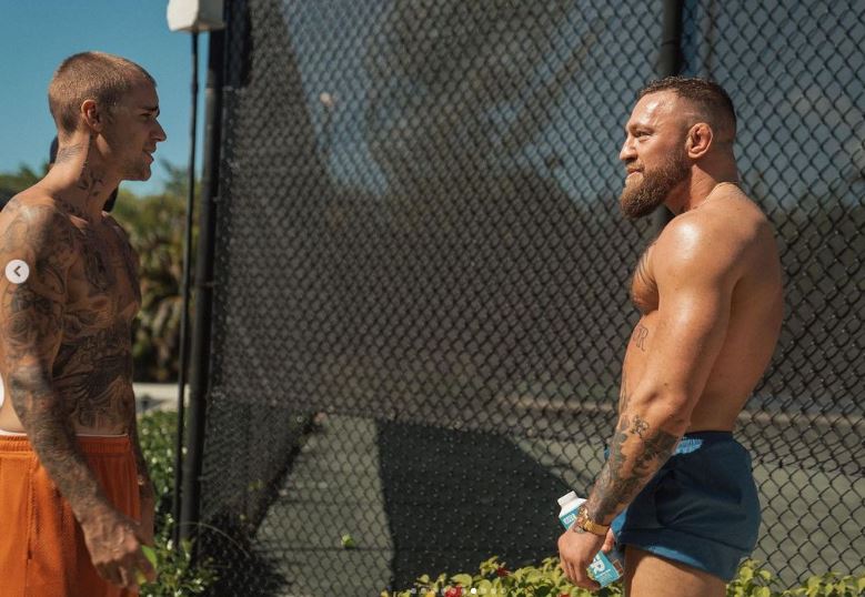 ‘Two goats chopping it up’ – UFC star Conor McGregor bumps into Justin Bieber in the Bahamas at tennis court