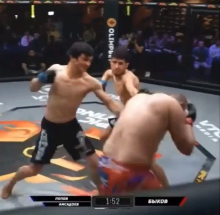 After two controversial fights, masked men climb into MMA cages to start a mass brawl