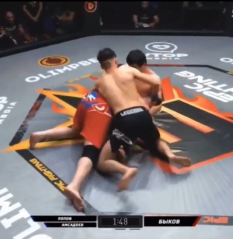 After two controversial fights, masked men climb into MMA cages to start a mass brawl