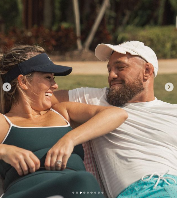 Conor McGregor smiling Dee Devlin during their 'Valentine's Day Workout'