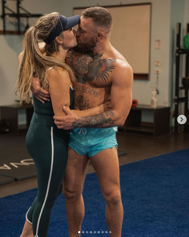 Conor McGregor smothers Dee Devlin during their 'Valentine's Day Workout', before they go on a cheesy movie date with snacks