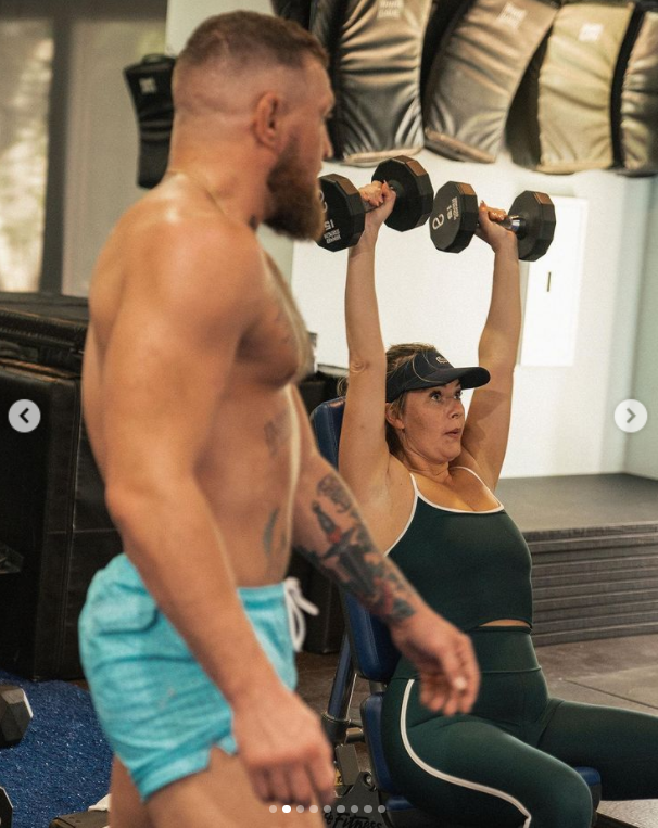 Conor McGregor smothers Dee Devlin during their 'Valentine's Day Workout', before they go on a cheesy movie date with snacks
