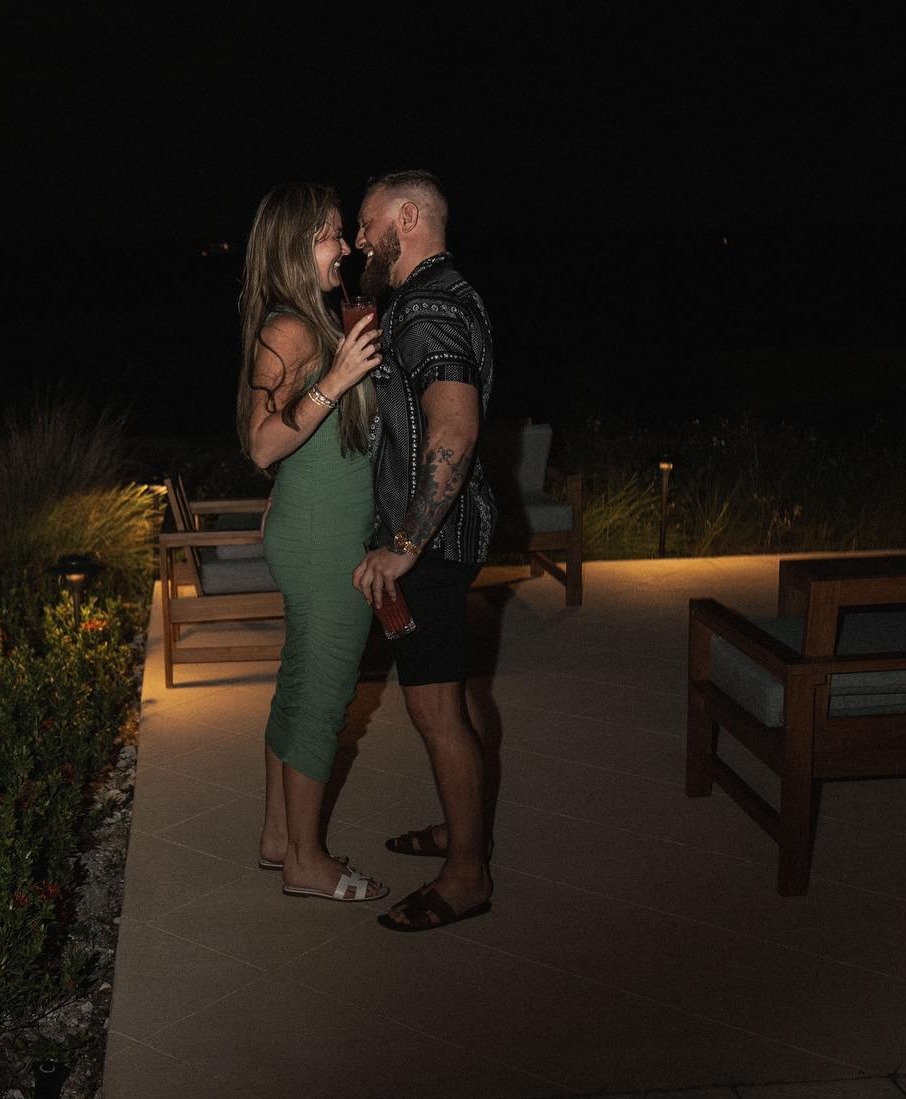 Conor McGregor smothers Dee Devlin during their 'Valentine's Day Workout', before they go on a cheesy movie date with snacks