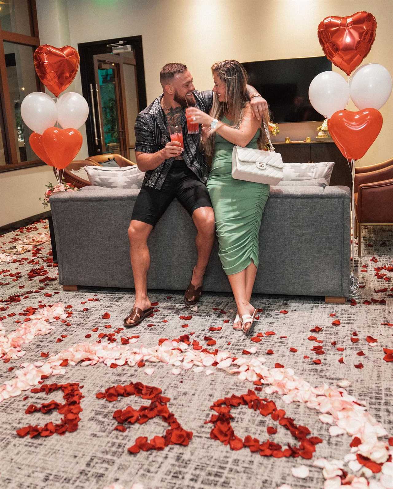 Conor McGregor smothers Dee Devlin during their 'Valentine's Day Workout', before they go on a cheesy movie date with snacks