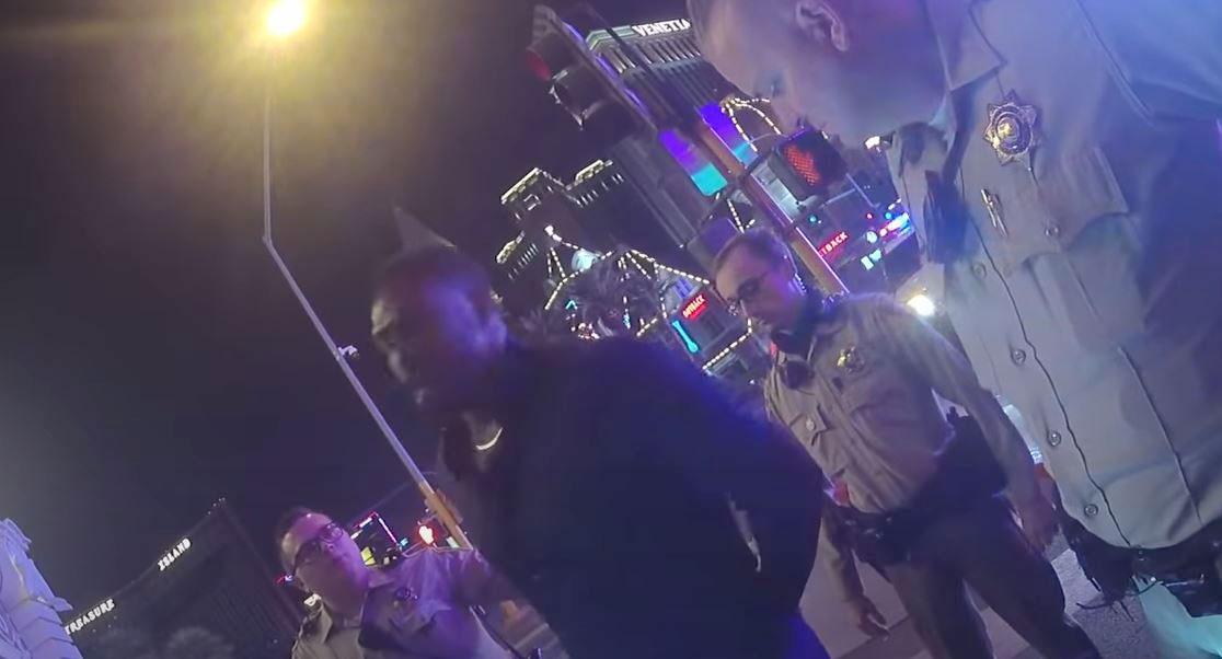 Worrying moment UFC fighter Jon Jones headsbutts a police car and shouts kill me to officers during his arrest