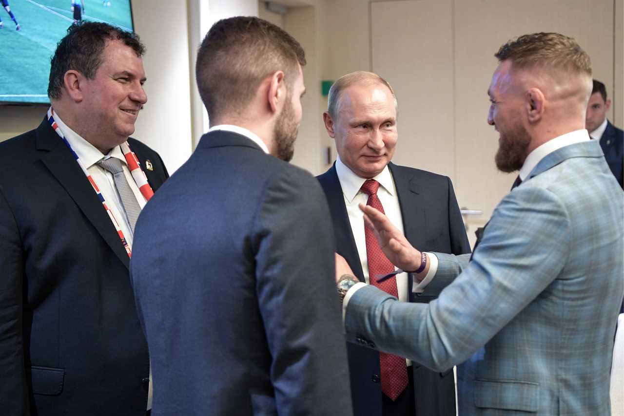 Watch Conor McGregor react to Vladimir Putin's security warning UFC star for arming himself around the Russian leader